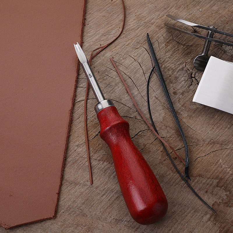 OUTIL DE COUPE biseauté en cuir incontournable pour artisans et