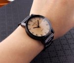 KEVIN nouveau Design Couple montres mode noir cadran rond en acier inoxydable bande Quartz montre-bracelet hommes femmes amant cadeaux