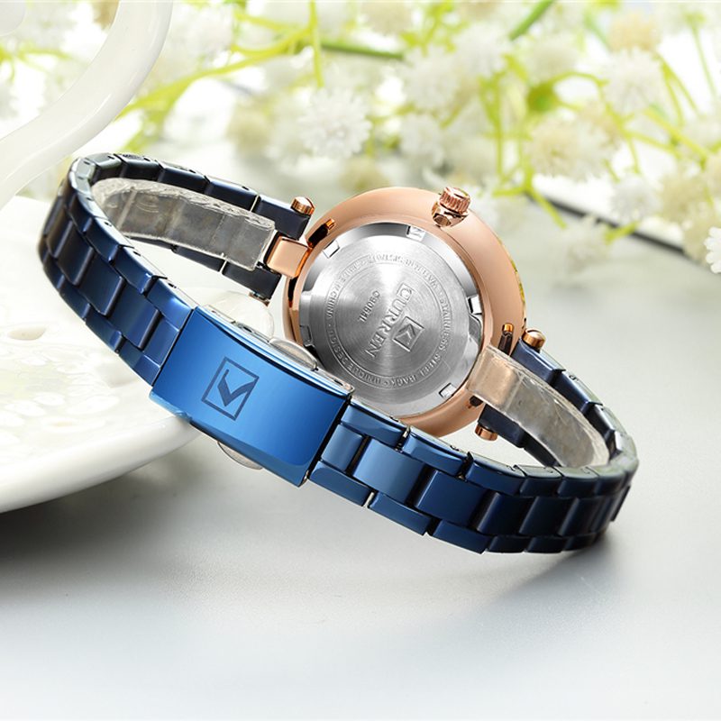 CURREN femmes montres de luxe Bracelet en métal montre-Bracelet chic mode Quartz horloge bleu femme en acier inoxydable robe montre