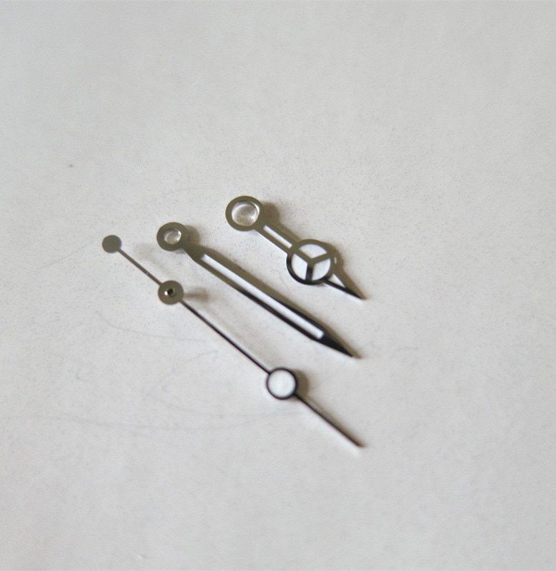 1-ensemble-montre-aiguilles-lumineuses-argent-plaqué-pour-ETA-2824-2784-Sub-Mariner-mouvement-de-montre 1 ensemble montre aiguilles lumineuses argent plaqué pour ETA 2824 2784 Sub Mariner mouvement de montre